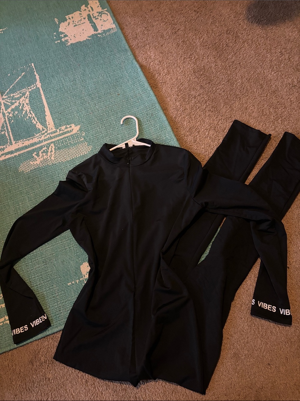 Black One-Piece Swim Suit with 'VIBES' Cuff Detail
